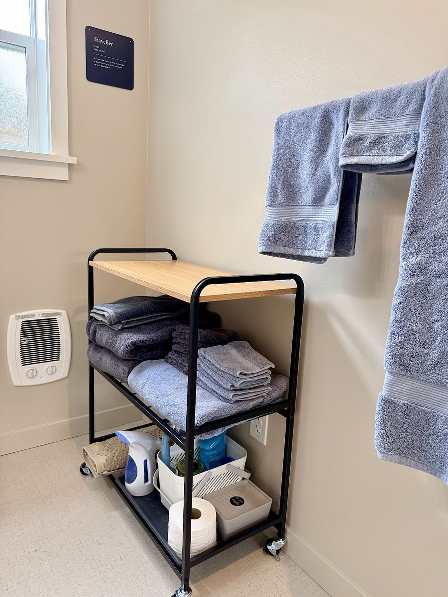 Bathroom storage cart and built-in electric cadet heater.