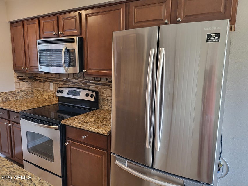 Built in Microwave, Electric Stove/Oven and Full Size Refrigerator