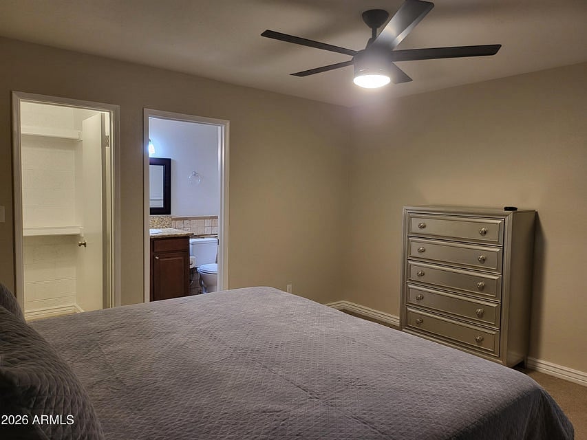 Bedroom 1- Dresser, Full Bathroom and Closet