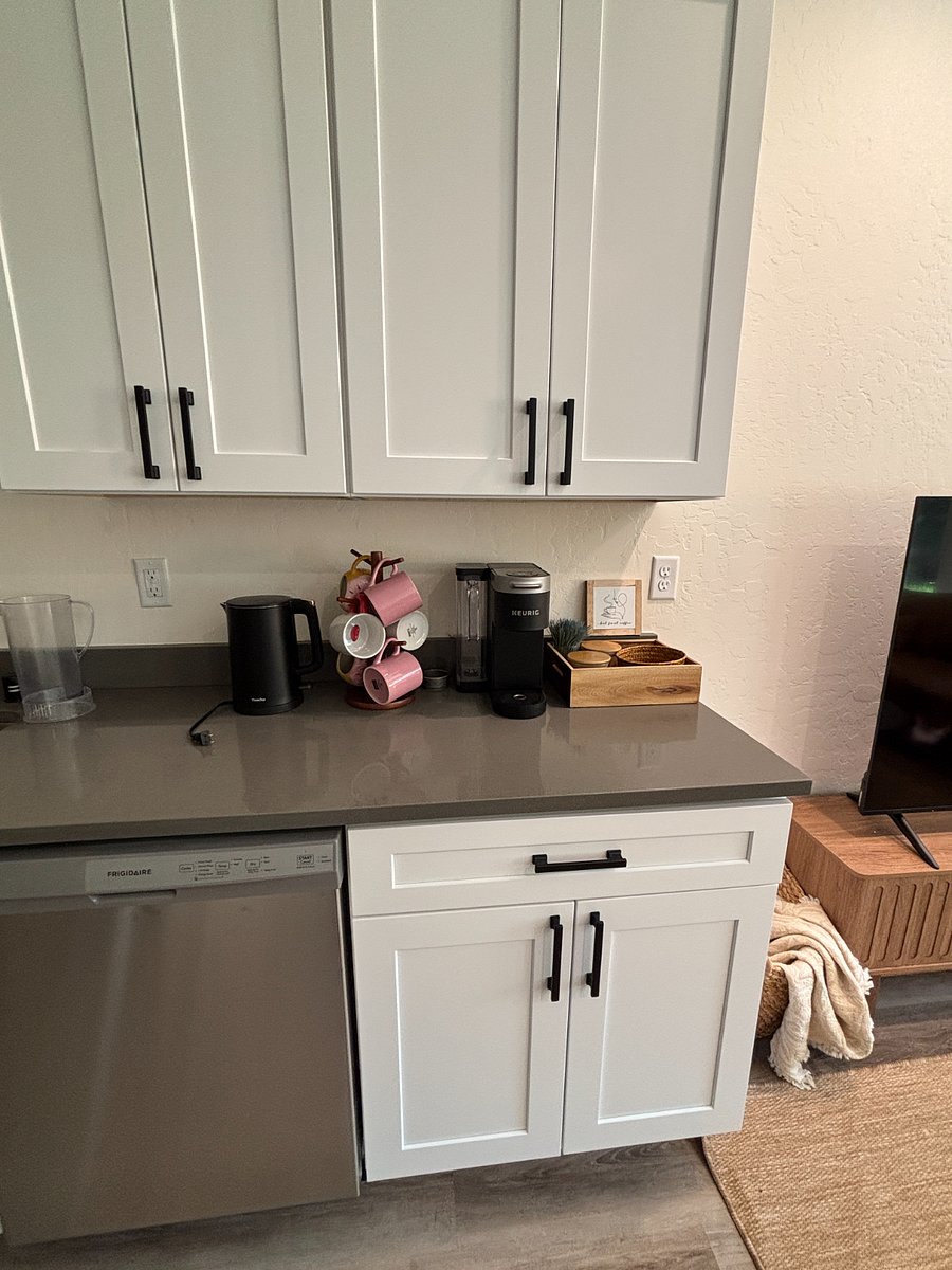 Coffee bar station wiith quality stoneware and a Kuerig