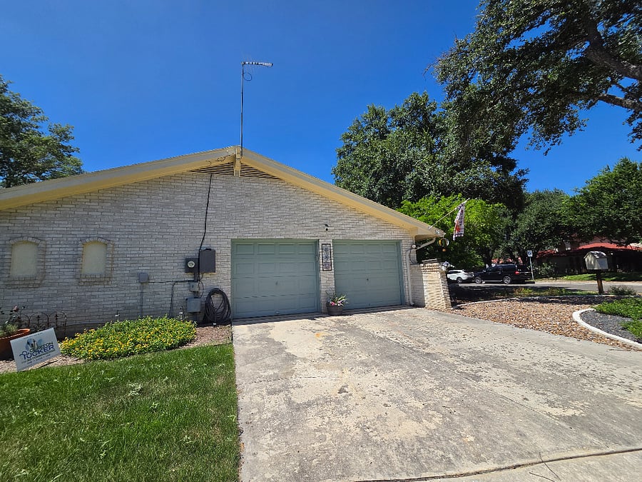 Parking on the left side of driveway.