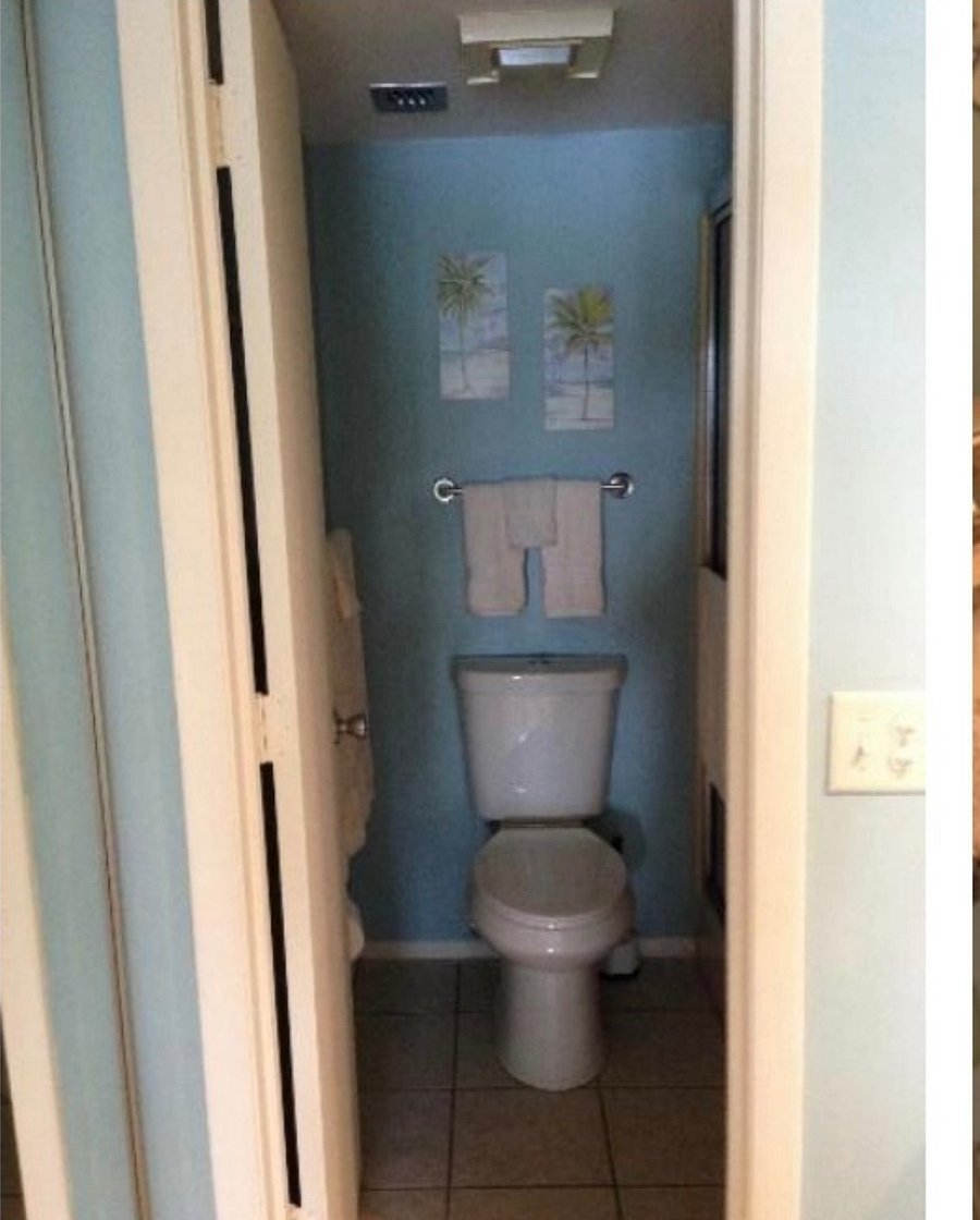 Master bedroom toilet and shower to the right with two built in seats.