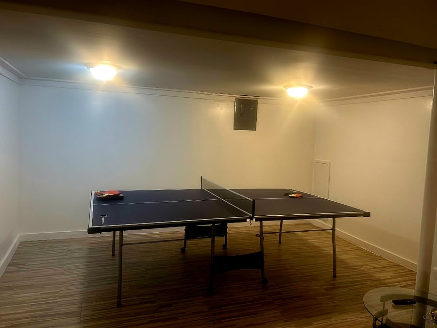 Ping pong table in basement