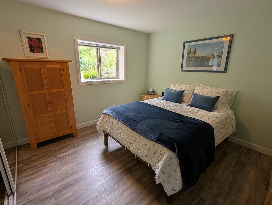 Queen bedroom with TV