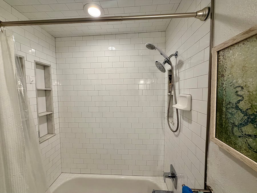 One built in marble shelf at front of shower and two built ins at back of shower!!!