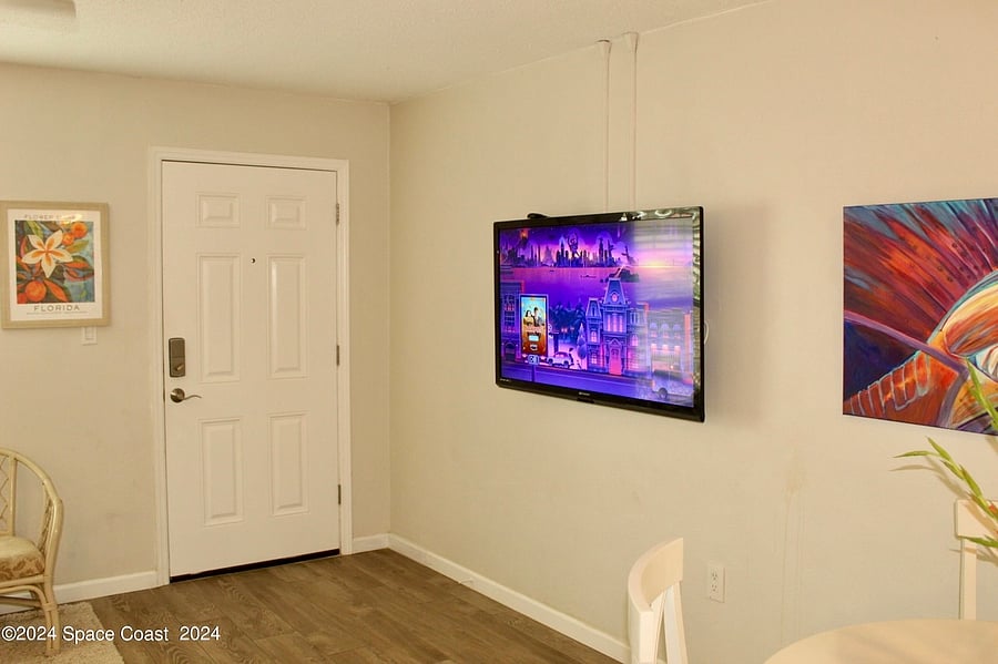 Large Wall Mounted Smart TV (cable and internet included in rent)