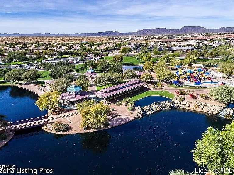 Anthem Community Center and park with multiple ponds for fishing, train rides and playground for kids, outdoor basketball, skatepark and ball fields