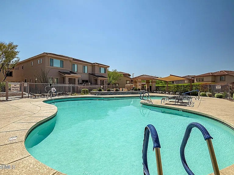 Quiet pool that also has an outdoor gas grill