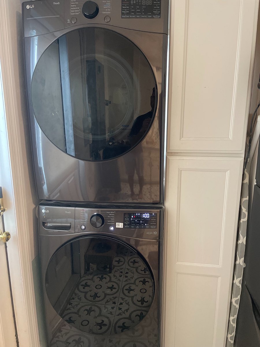 Laundry Room with Brand New Stackable Washer & Dryer