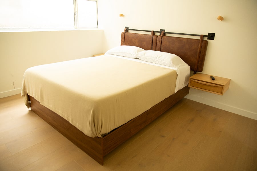 Queen bed and TV in bedroom