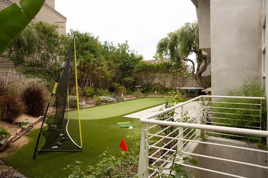 Private backyard with putt putt green