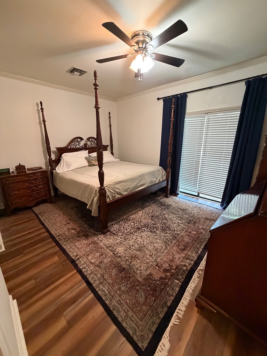 Master bedroom with bath, large walk-in closet.   Downstairs
