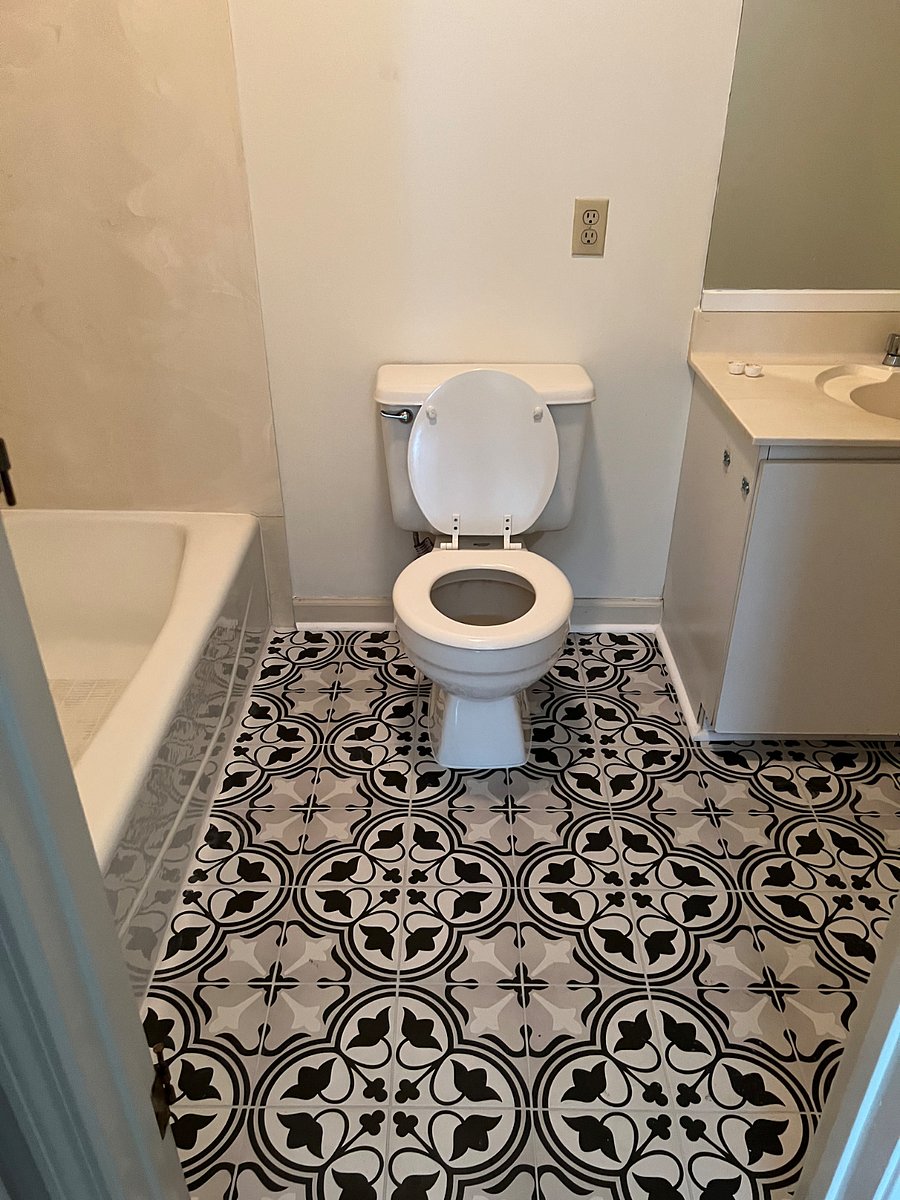 Upstairs Bath with new flooring and paint. 