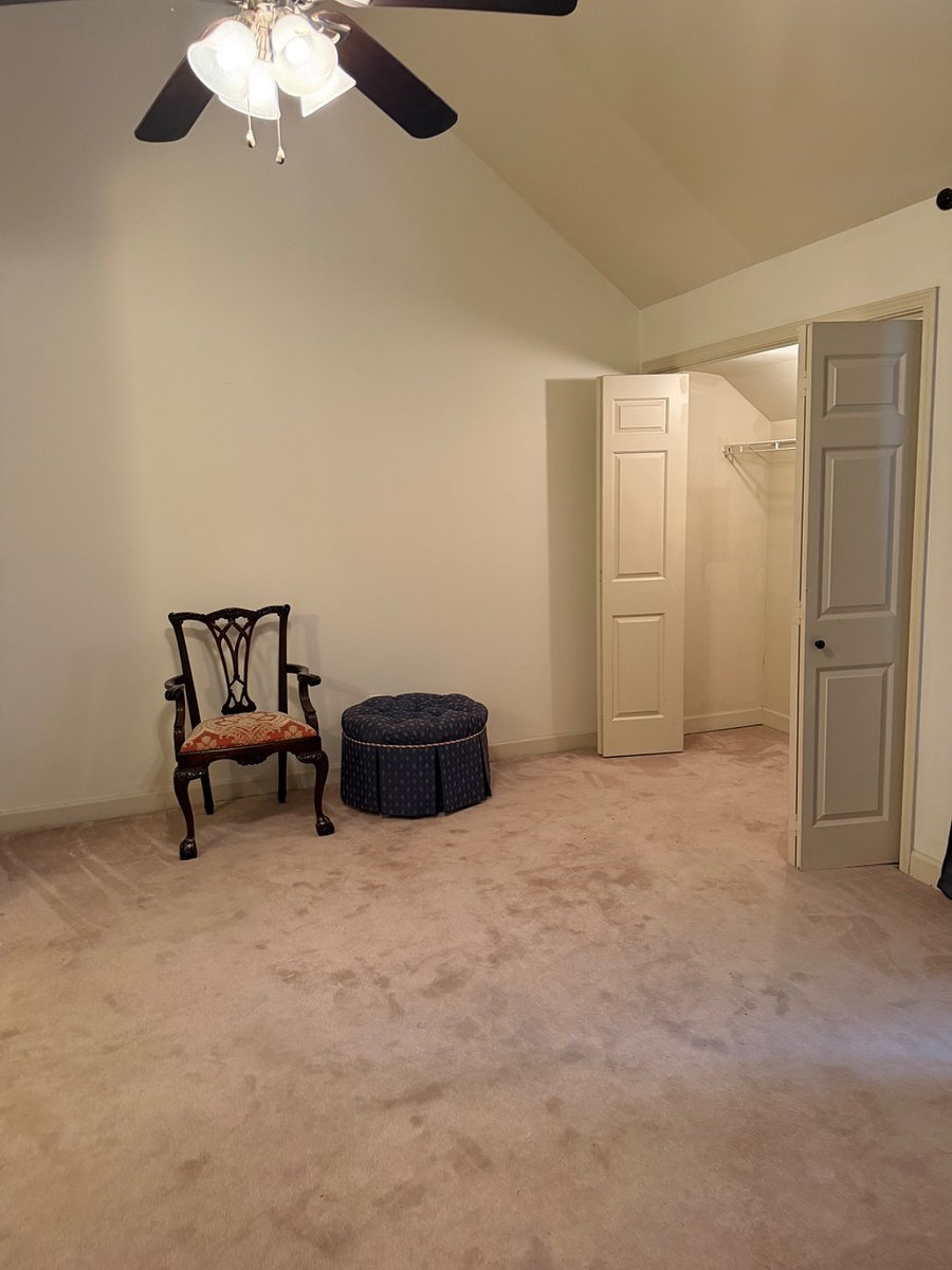 Upstairs bedroom with bath and walk-in closet.    Not furnished but working on it now.  