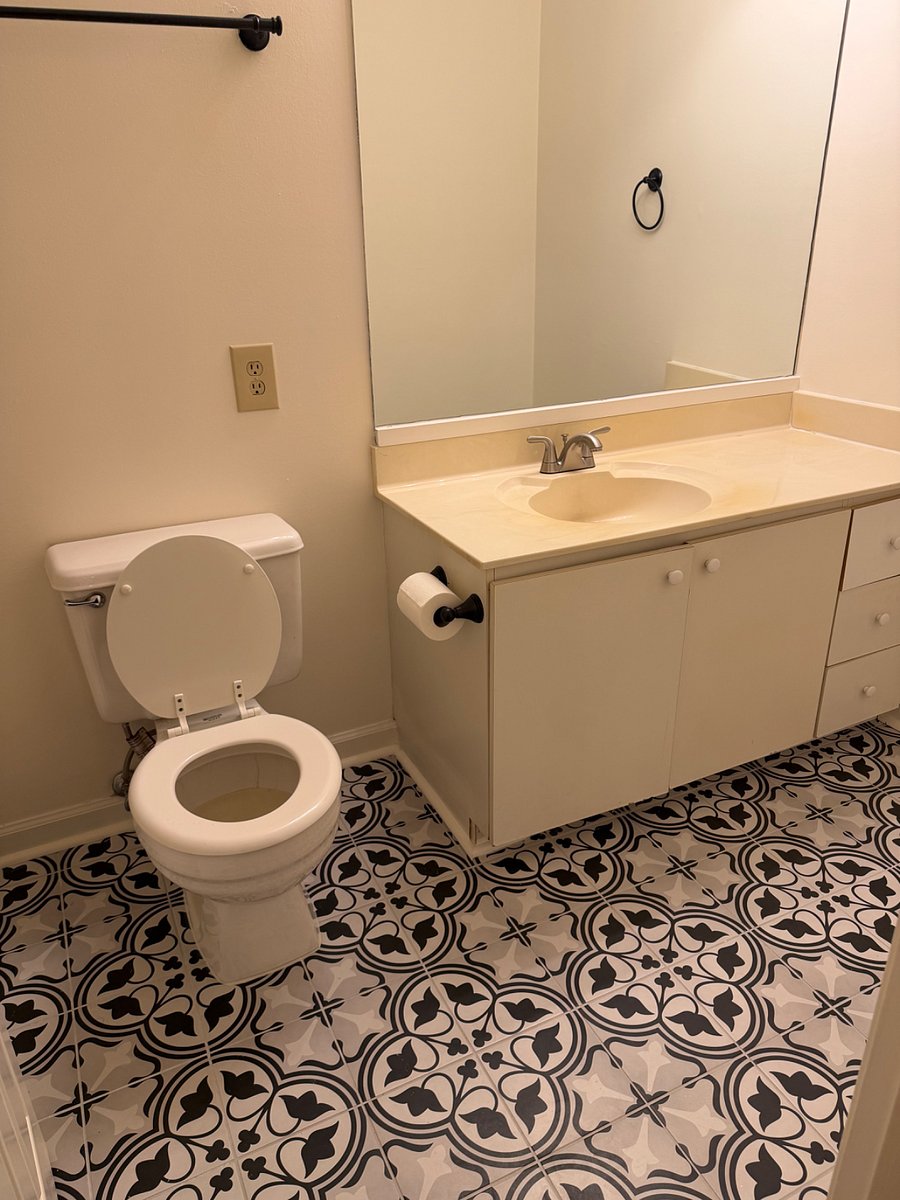 Upstairs bath with new flooring and paint. 