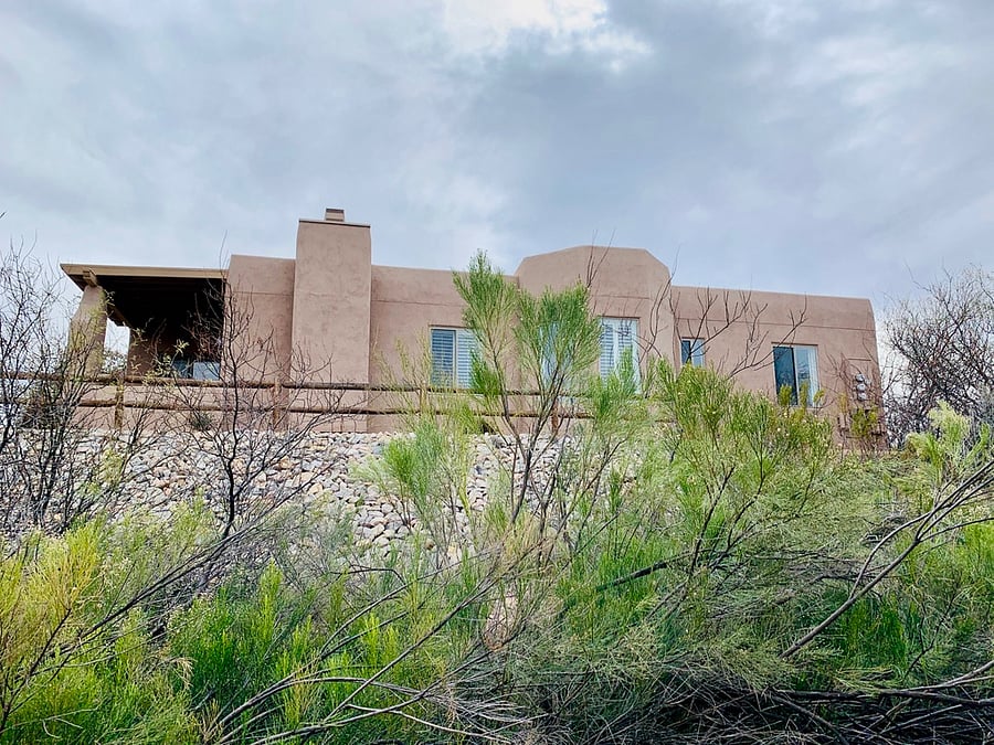 View of our home from our walking trail below.