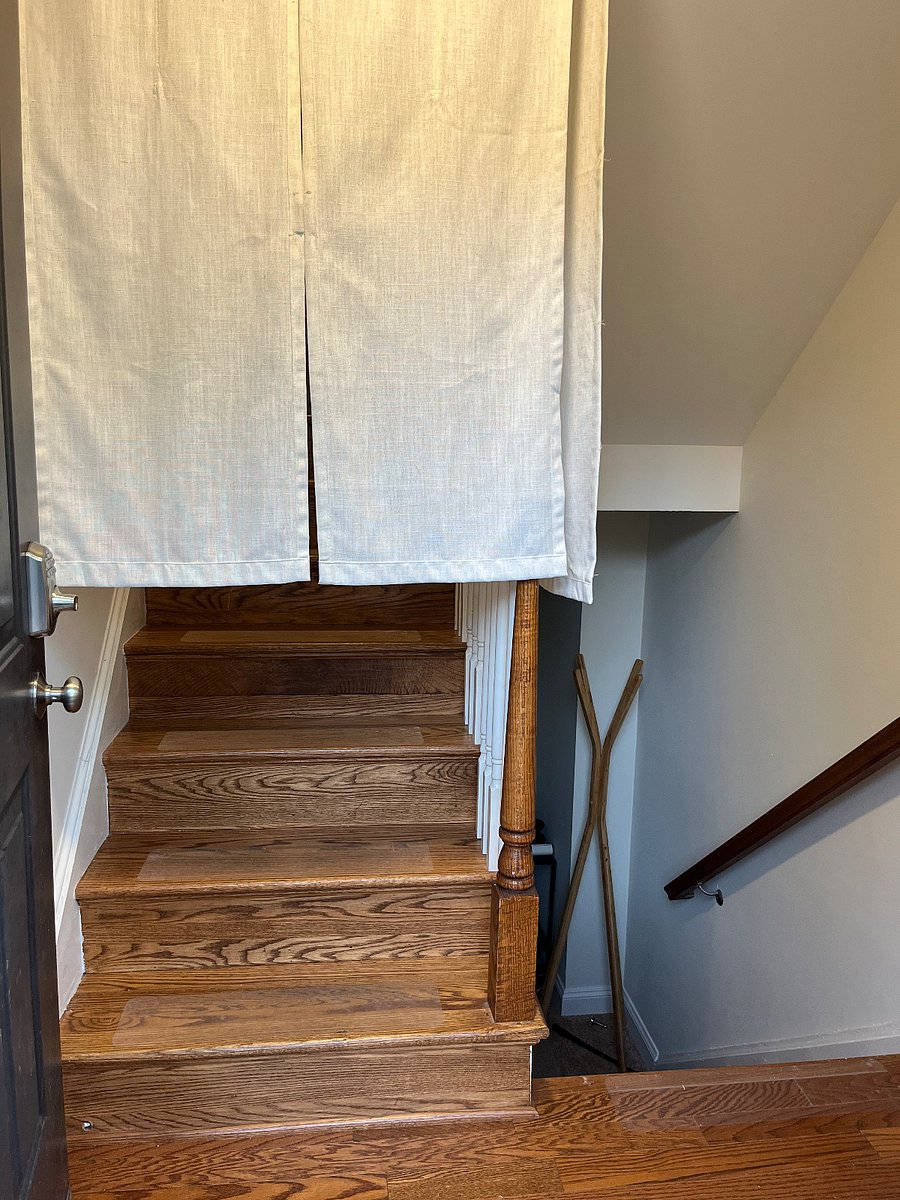 Main entrance split level with privacy curtains