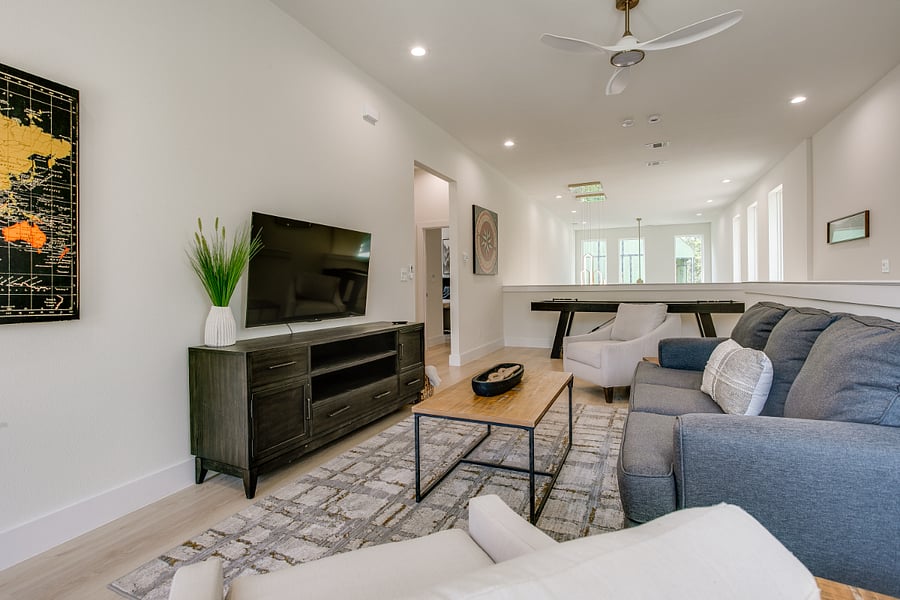 Upstairs loft living room with pullout couch with smart TV.