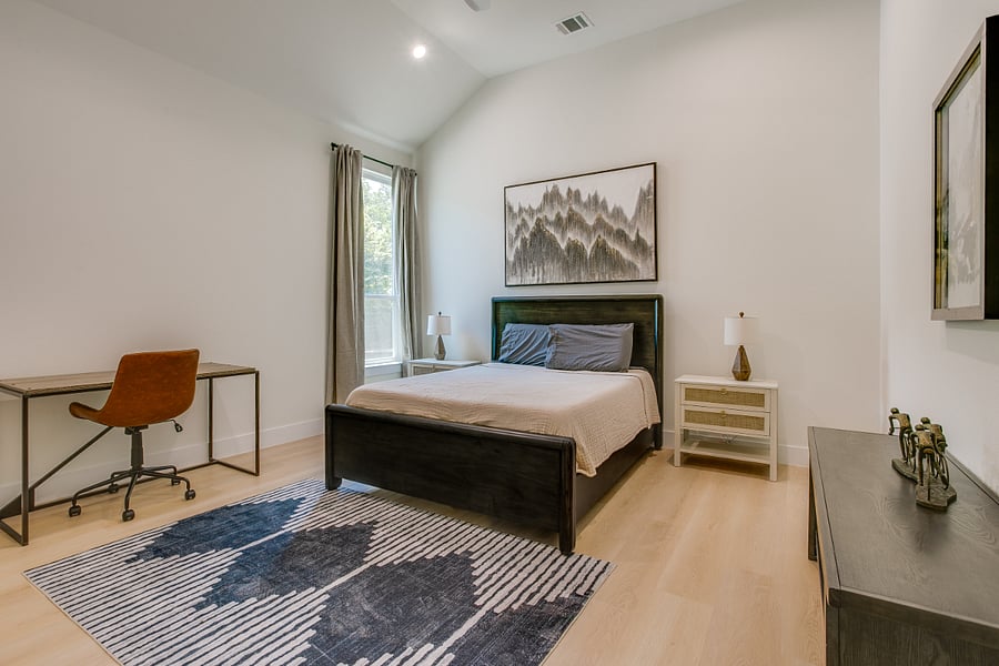 Upstairs bedroom with desk and QUEEN size bed.