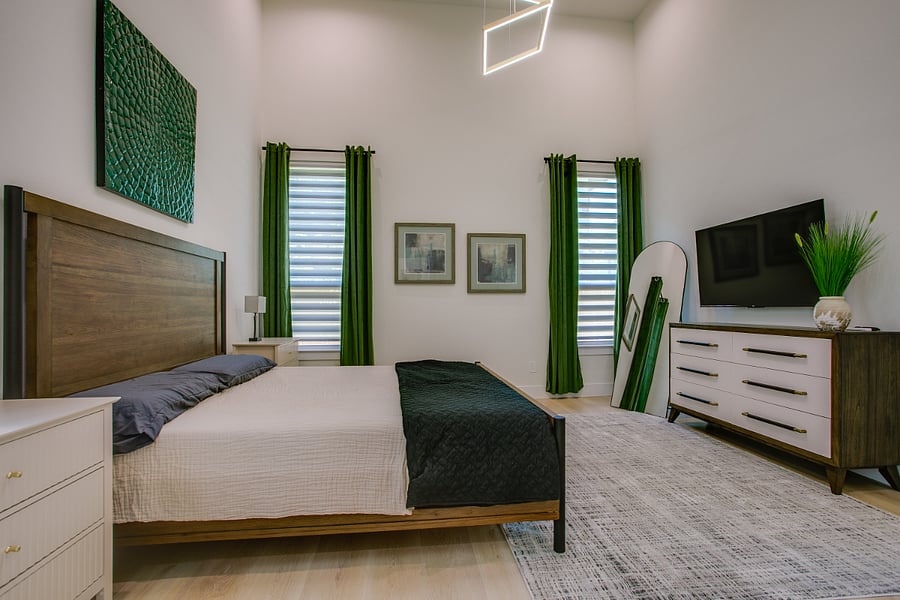 Downstair primary bedroom with KING size bed, smart TV, and blackout curtains.