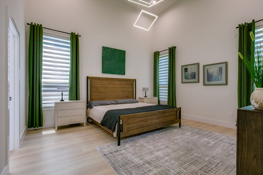 Downstair primary bedroom with KING size bed, smart TV, and blackout curtains.