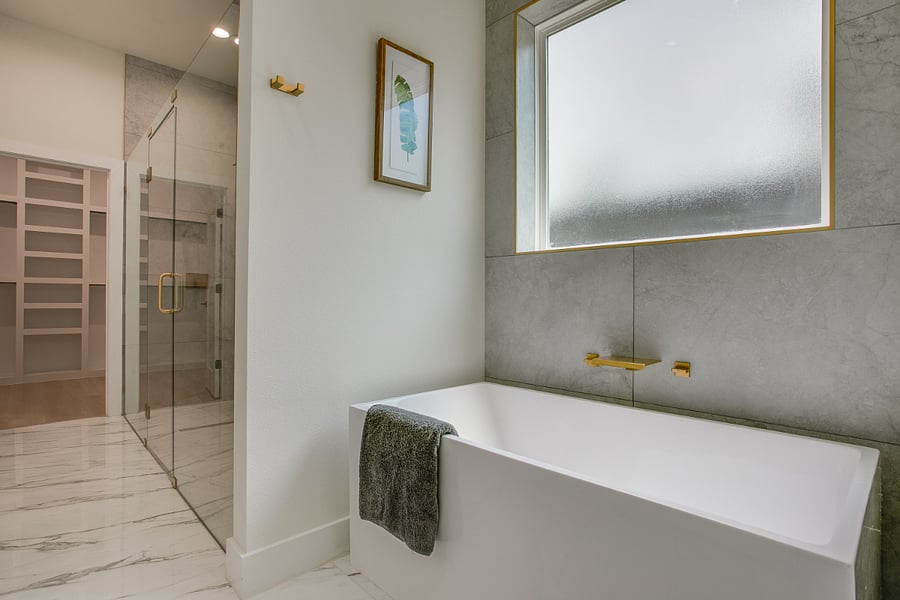 Primary bath with luxury shower, full size bath, dual sink and full size closet.