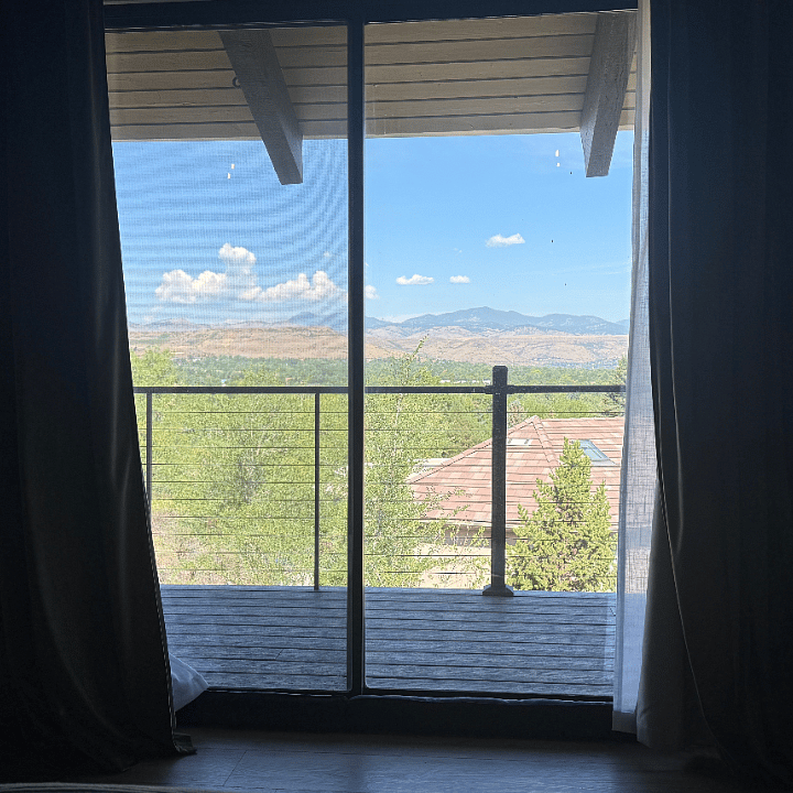 View from your bed in the Primary Bedroom. Imagine waking up to this view every morning and watching the sunset in the evening.