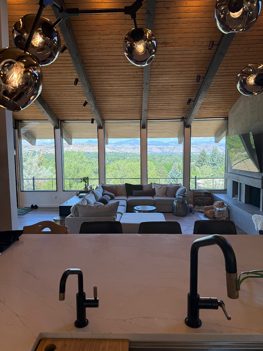 View from the Kitchen sink. Also looking directly down on the Main Level Living Room