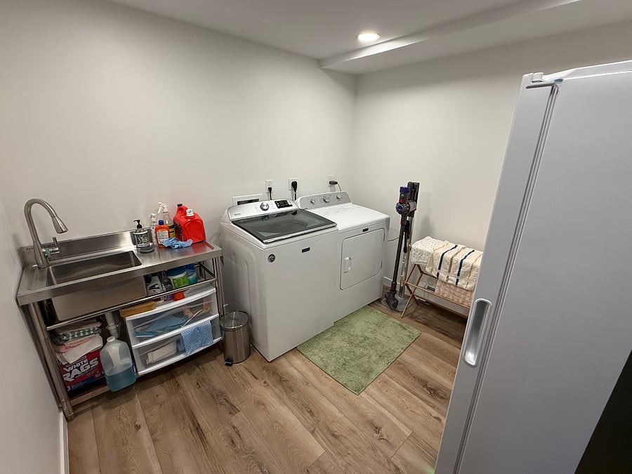 Lower Level Laundry Room with 2nd refrigerator.