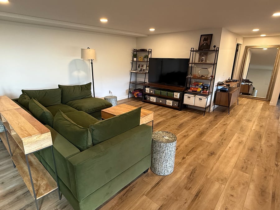 Lower Level Living Room can double as a work out / yoga space.