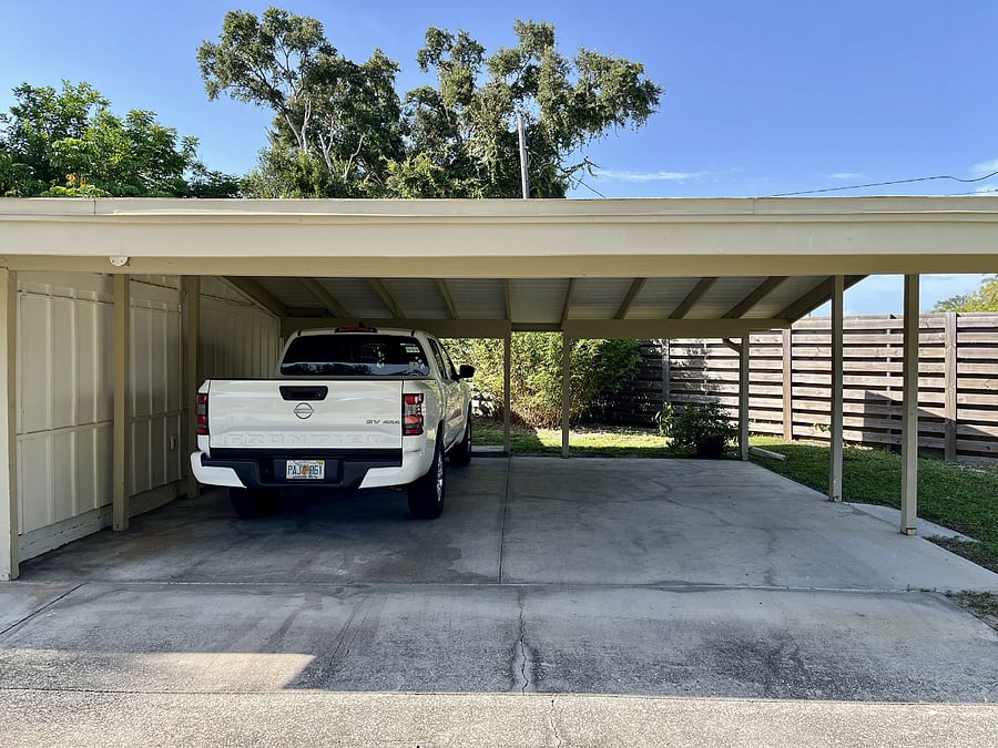 DEDICATED, COVERED CARPORT PARKING