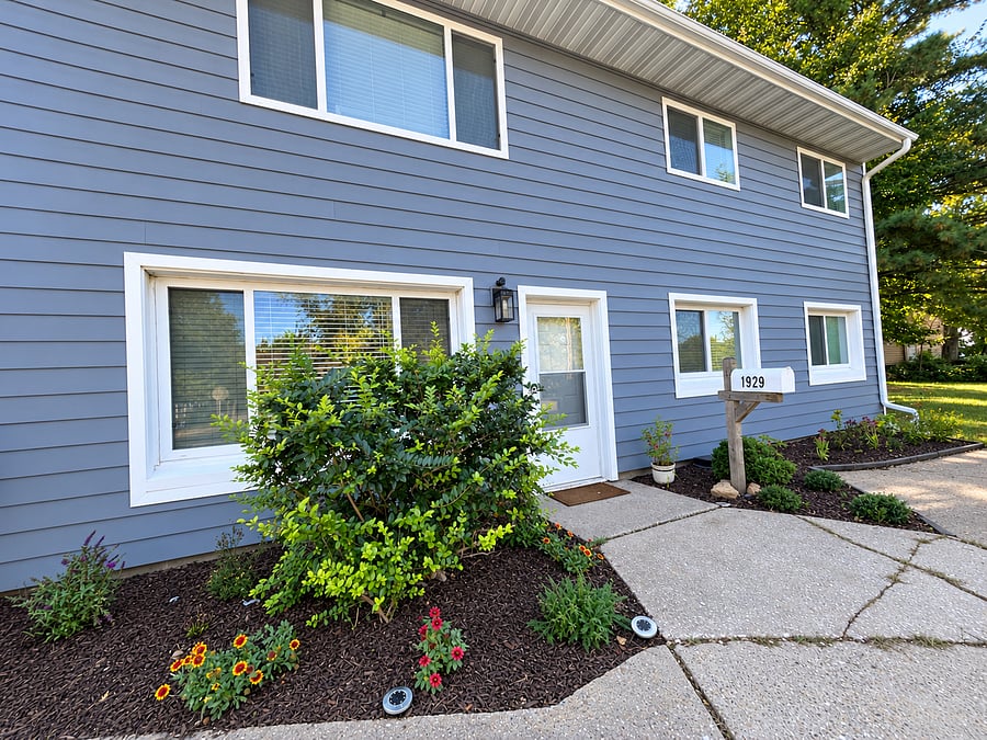 Entrance to private lower unit with 2 parking spots in driveway