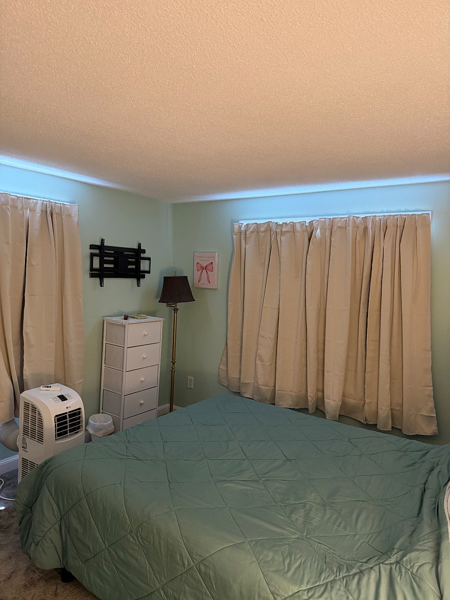 Blackout curtains in both bedrooms