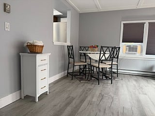 Brand new table that seats four  people 