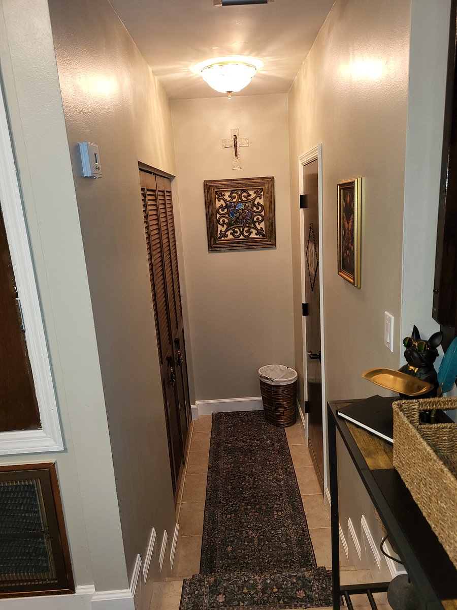 Washer dryer behind bifold doors
Half bath
