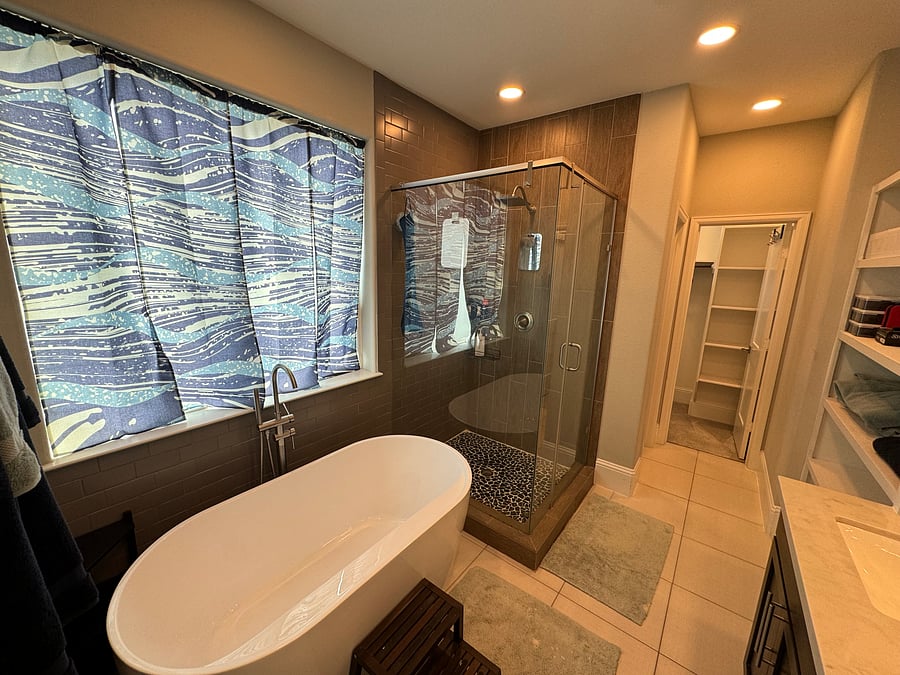 Master bedroom en-suite master bathroom with large soaking tub and standing shower
