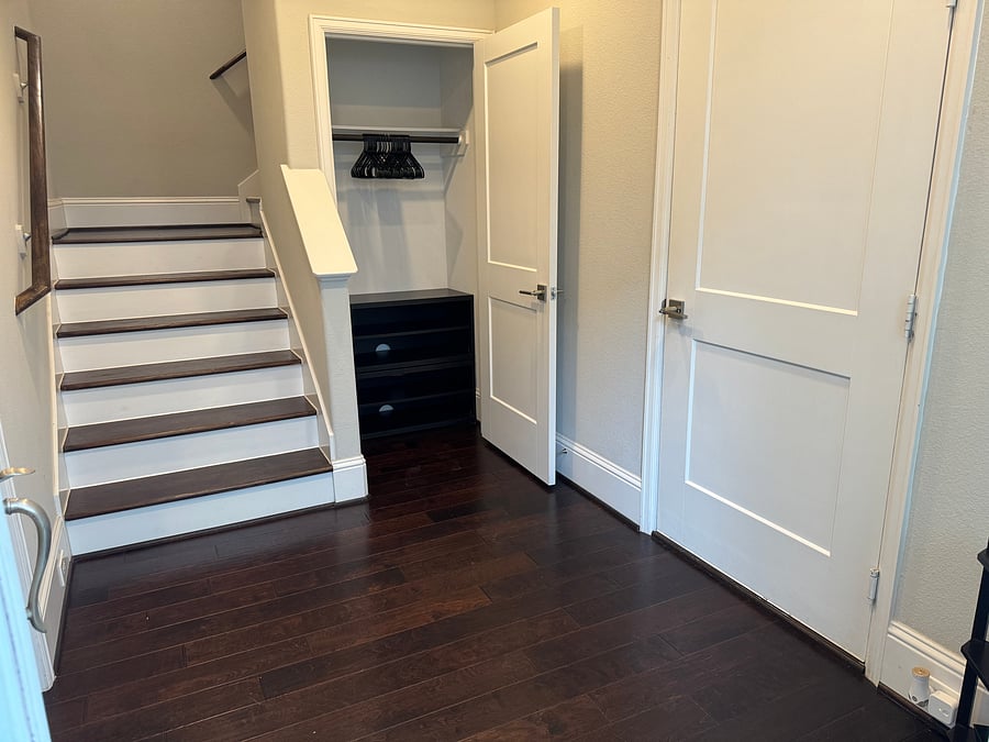 Entry foyer with shoe cabinet and coat closet