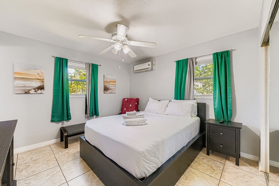Master bedroom with queen bed. 