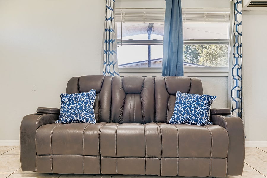 Double recliner with center fold down.