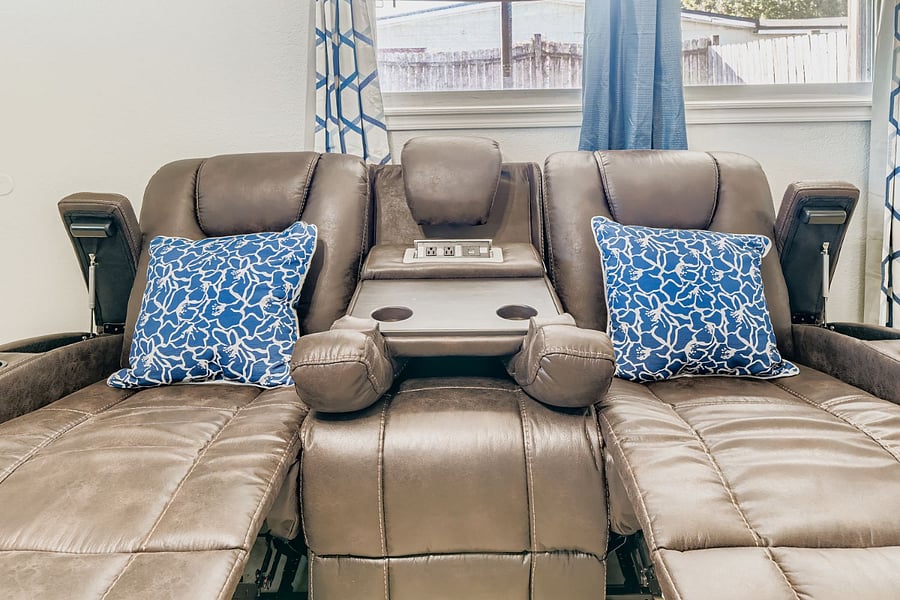 Double recliner with center fold down.