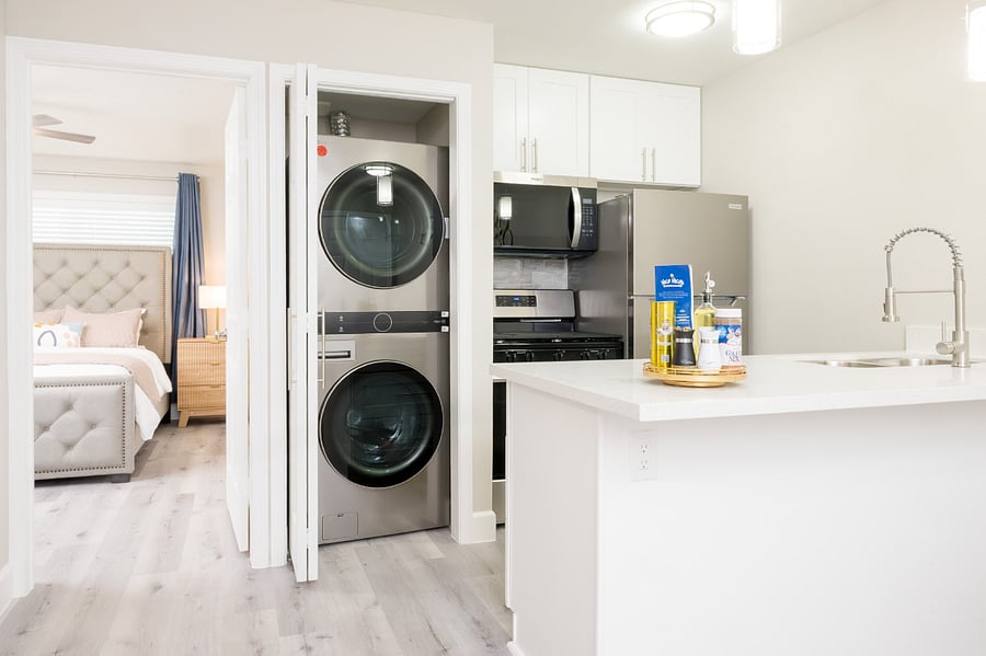 Convenient in-unit laundry featuring a high-end stacked washer and dryer for your stay.
