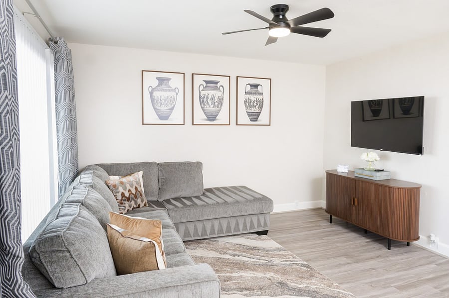 Experience comfort and style in this light-filled living area.