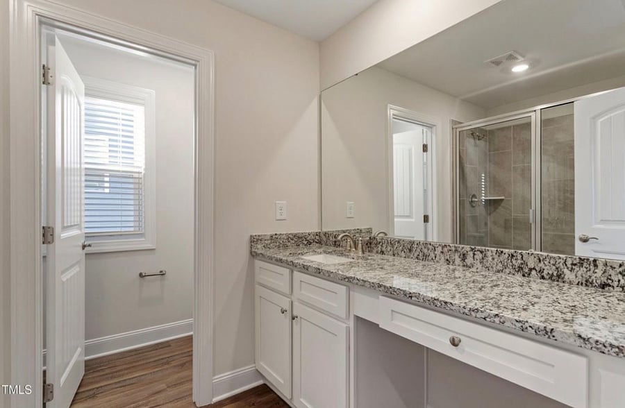full master bathroom with walk-in shower