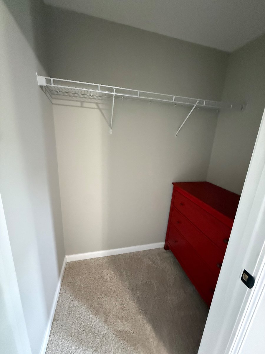 Bedroom # 1 walk in closet with dresser 
