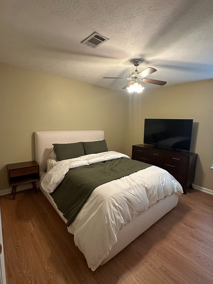 Private Queen Bedroom with 55 inch Smart TV.