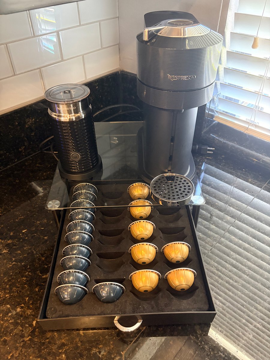 Milk Frother included. Sugar in cabinet above. 