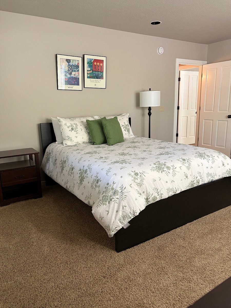 Bedroom 2 has a queen size bed.