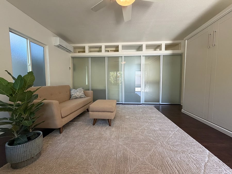 living space with sliding glass dividers closed.