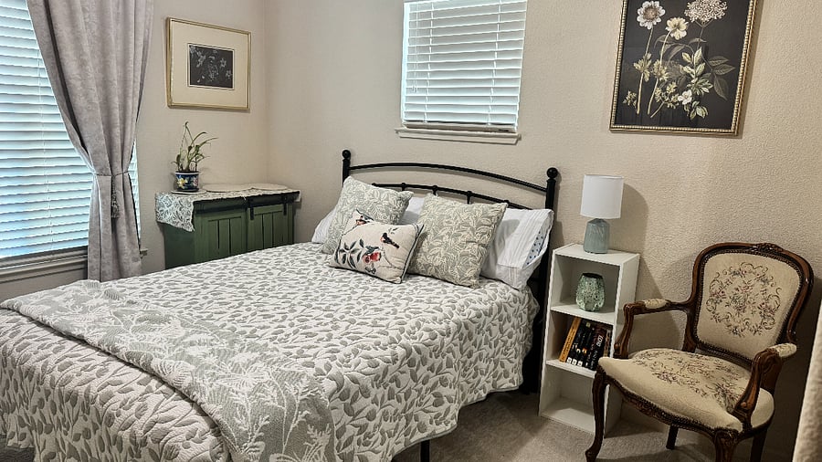 Full size bed with comfy mattress, coffee bar, chair and bookshelf. 