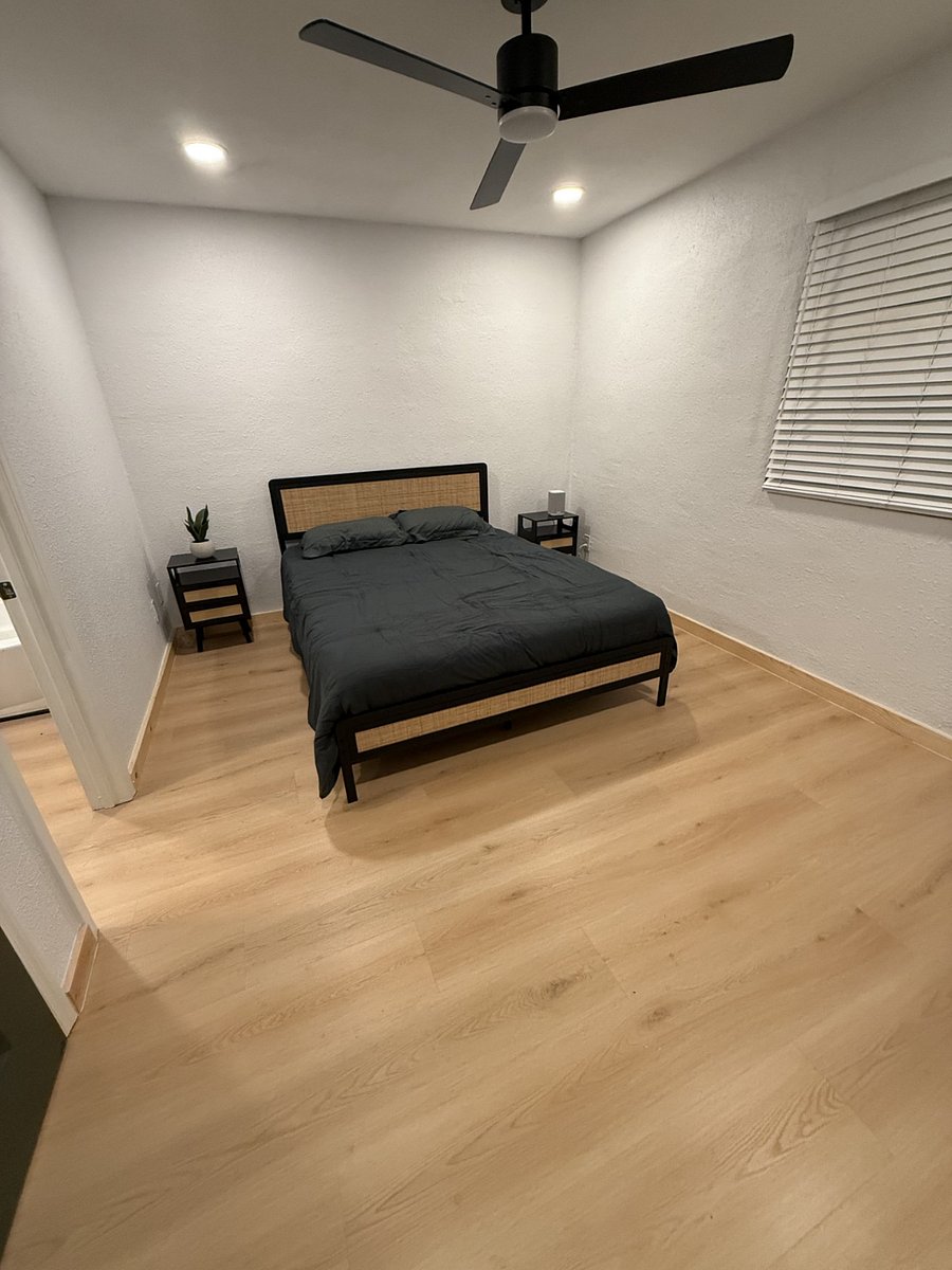Rattan bed and nightstands. Freestanding closet space saver (not shown in picture) Ratt